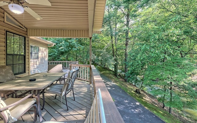 wooden deck with ceiling fan