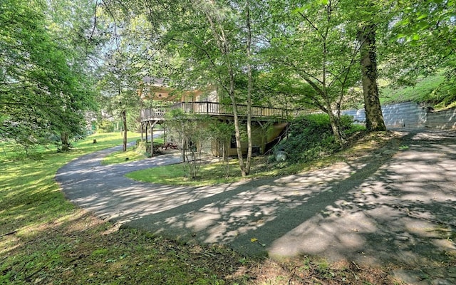 surrounding community with a wooden deck