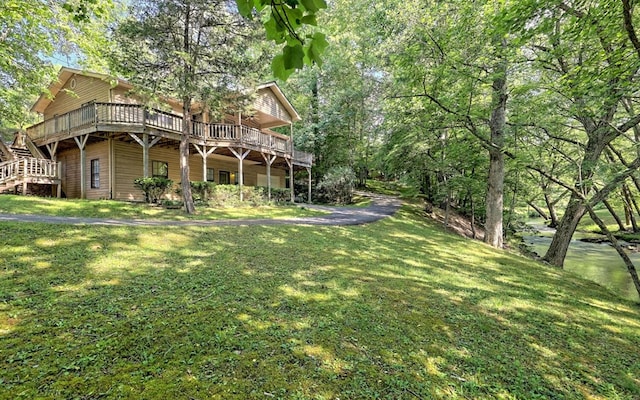 view of yard featuring a deck