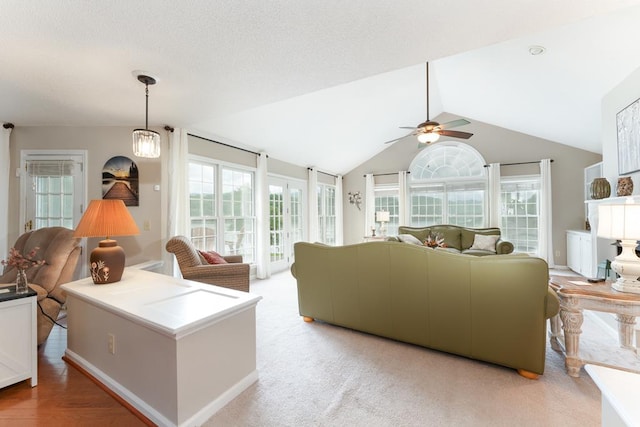 1537 Victoria Woods Dr, Hiawassee, GA 30546 - living room featuring a ceiling fan and vaulted ceiling