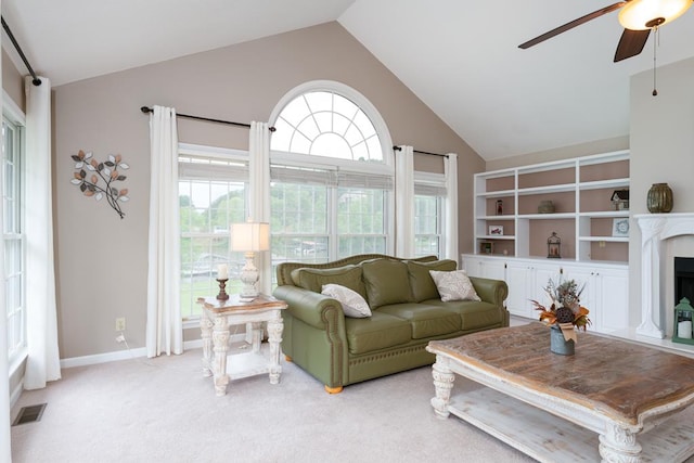 1537 Victoria Woods Dr, Hiawassee, GA 30546 - living area with ceiling fan, light carpet, high vaulted ceiling, baseboards, and a fireplace