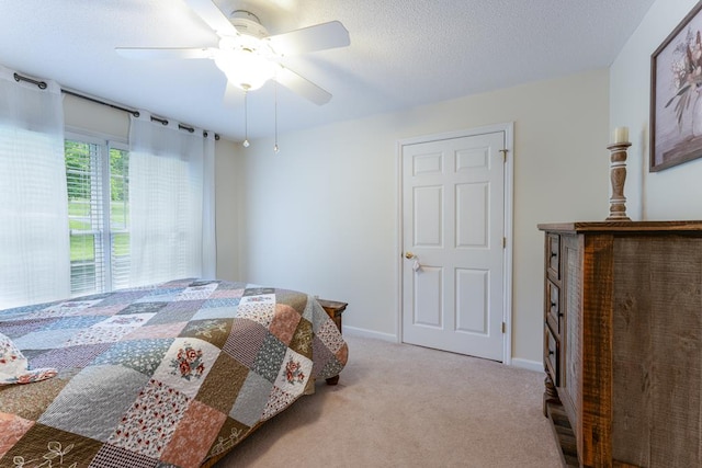 1537 Victoria Woods Dr, Hiawassee, GA 30546 - bedroom with carpet floors, a ceiling fan, baseboards, and a textured ceiling