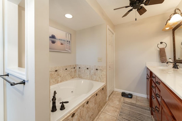 1537 Victoria Woods Dr, Hiawassee, GA 30546 - full bath featuring a jetted tub, double vanity, tile patterned flooring, a ceiling fan, and baseboards