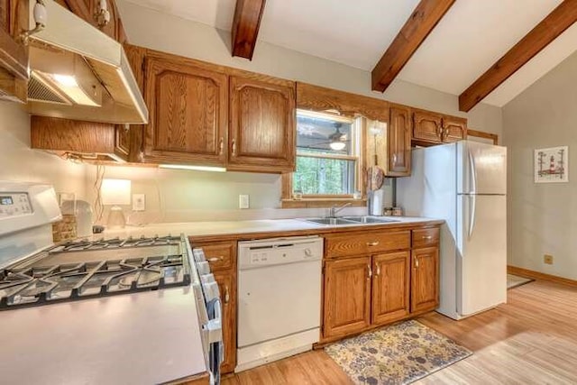 kitchen with lofted ceiling with beams, light wood-type flooring, white appliances, and sink