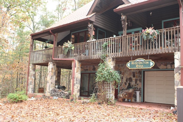 exterior space featuring a deck and a garage