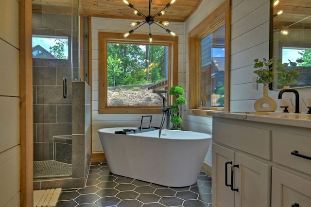 bathroom with vanity, shower with separate bathtub, and wooden ceiling