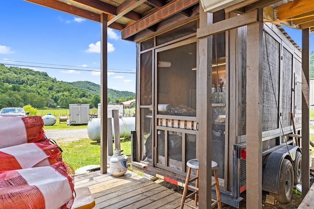 wooden terrace with a mountain view