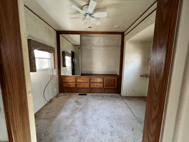 unfurnished bedroom with ceiling fan