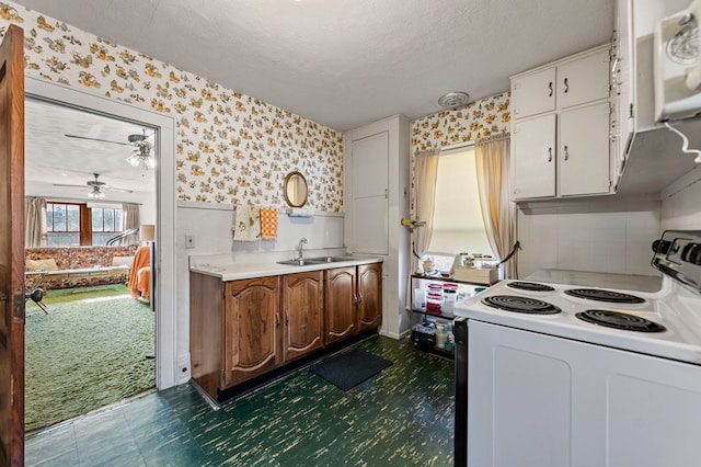 134 Church St, Copperhill, TN 37317 - kitchen featuring white cabinetry, sink, a textured ceiling, and white electric stove