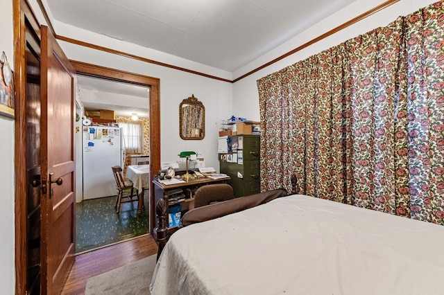 134 Church St, Copperhill, TN 37317 - bedroom with hardwood / wood-style floors, white fridge, and ornamental molding