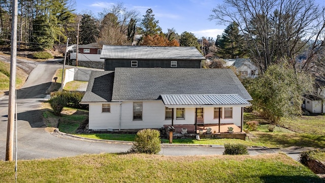 134 Church St, Copperhill, TN 37317 - view of front of property with covered porch and a front yard