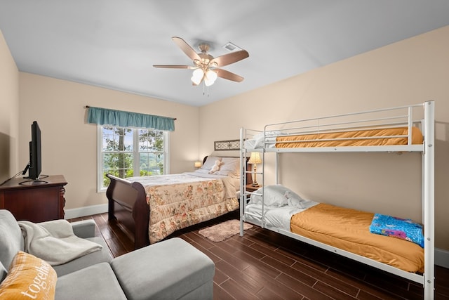 bedroom featuring ceiling fan and hardwood / wood-style flooring