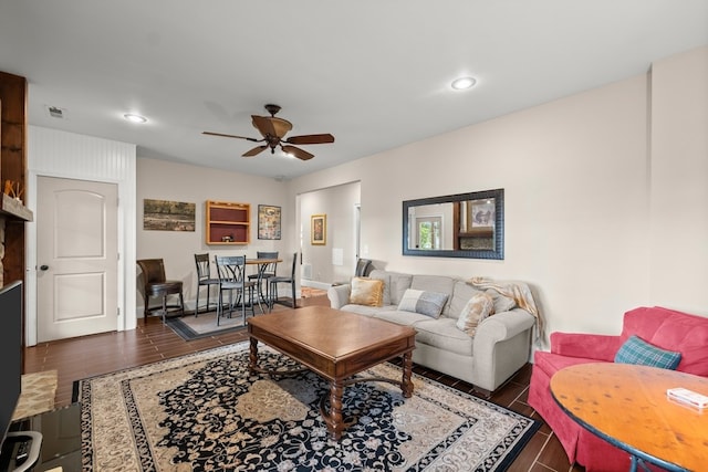 living room featuring ceiling fan