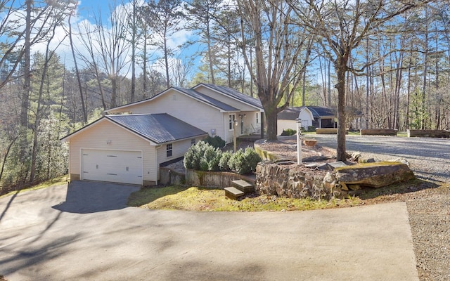 view of property exterior with a garage