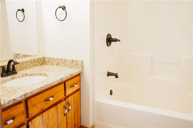 bathroom with shower / bath combination and vanity