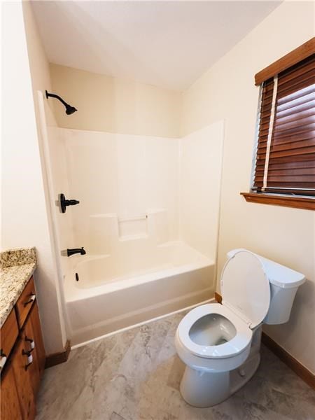 full bath featuring baseboards, bathtub / shower combination, toilet, and vanity