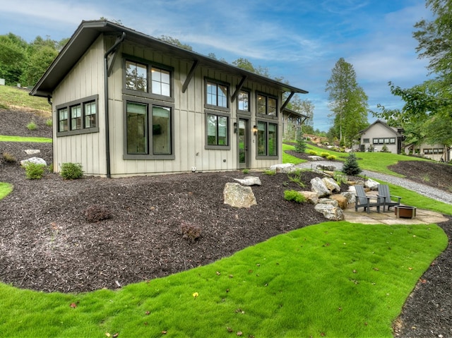 view of property exterior with a yard