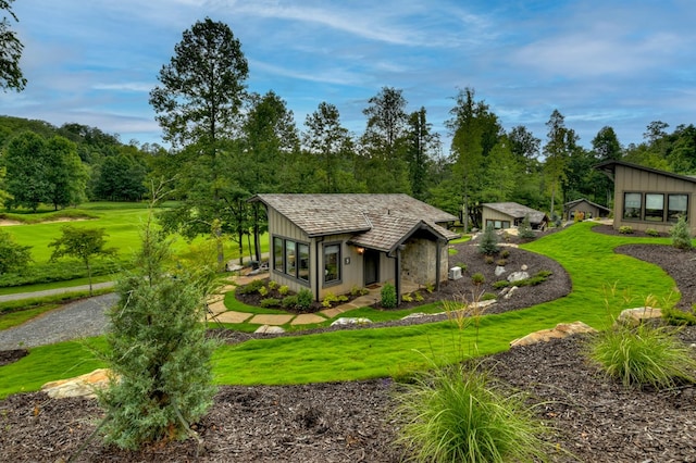 exterior space with a front lawn