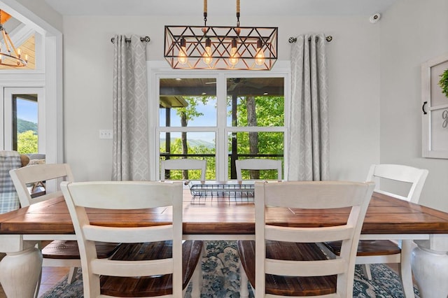 dining room featuring a chandelier