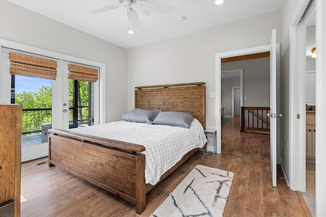 bedroom with access to exterior, wood finished floors, recessed lighting, and a ceiling fan