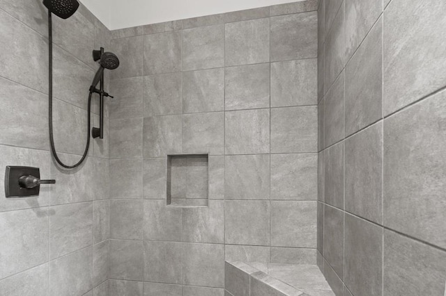 bathroom view of tiled shower