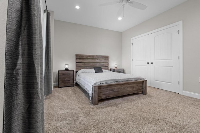bedroom with carpet floors, baseboards, recessed lighting, ceiling fan, and a closet