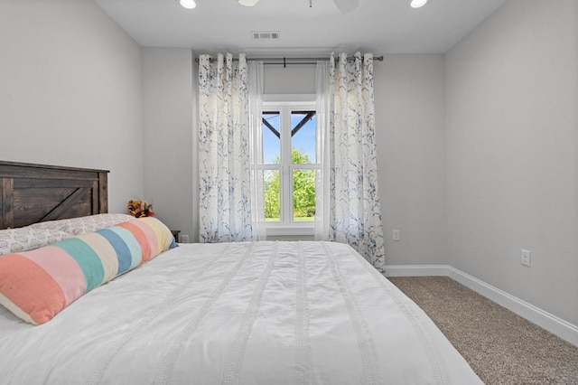 carpeted bedroom featuring baseboards, recessed lighting, and ceiling fan