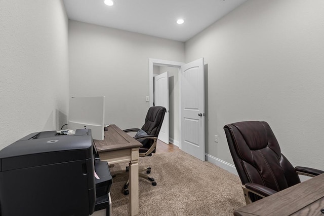 office space featuring carpet flooring, recessed lighting, and baseboards