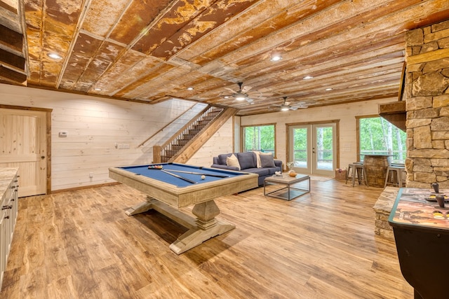 game room with french doors, a ceiling fan, billiards, and light wood-type flooring