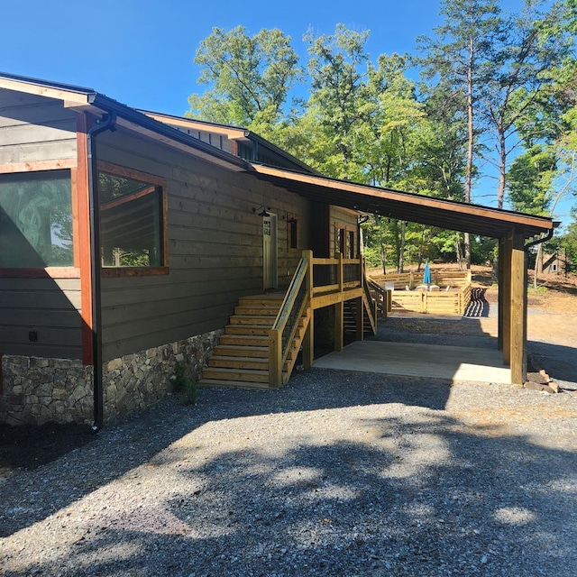 view of home's exterior featuring stairway
