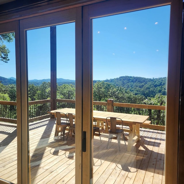 exterior space with a view of trees and a mountain view