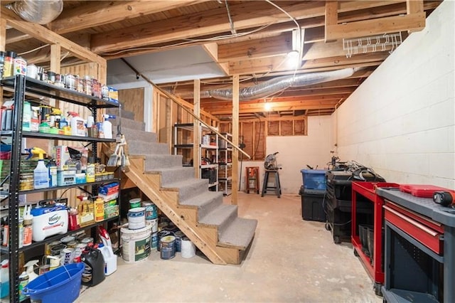 unfinished basement with stairs