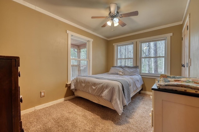 bedroom featuring baseboards, light carpet, and ornamental molding