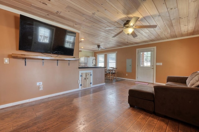 living room with baseboards, wood-type flooring, wood ceiling, and ornamental molding