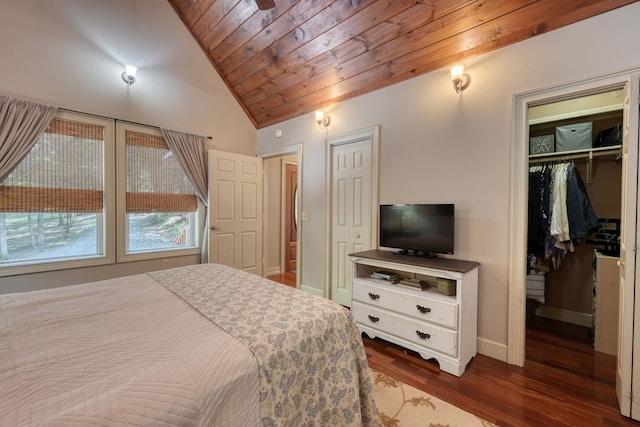 bedroom featuring a closet, wooden ceiling, dark wood-type flooring, and vaulted ceiling