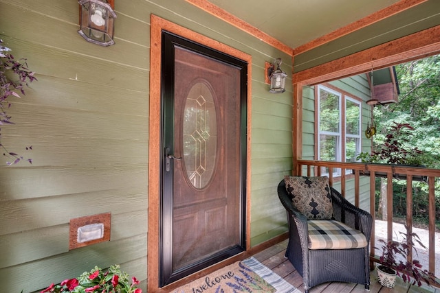 doorway to property with a porch