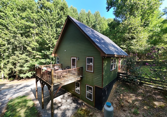 view of home's exterior with a deck