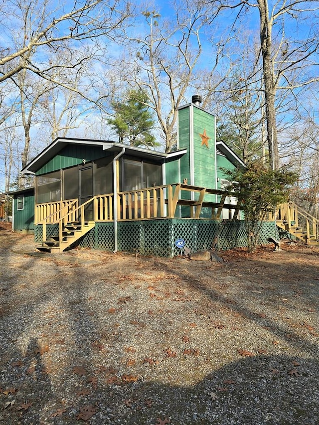 exterior space with a sunroom