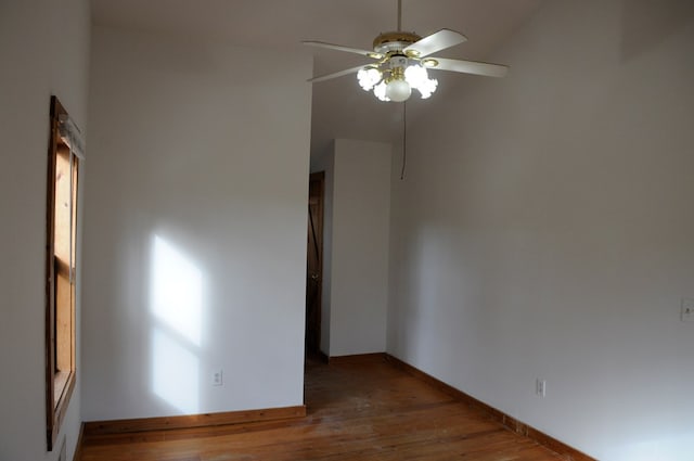 unfurnished room with ceiling fan and wood-type flooring