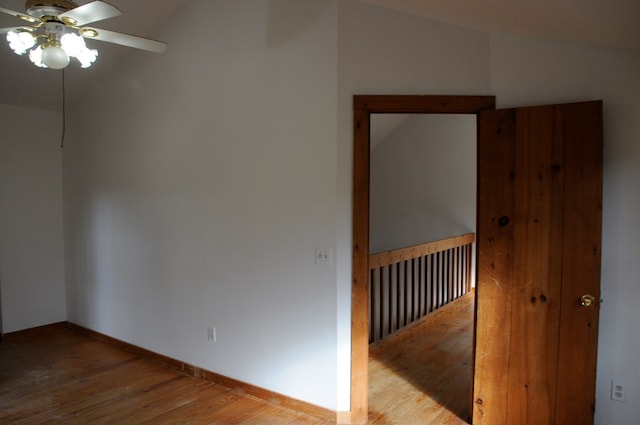 empty room featuring light hardwood / wood-style flooring and ceiling fan