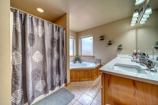 bathroom featuring a bathing tub, double sink vanity, and tile flooring