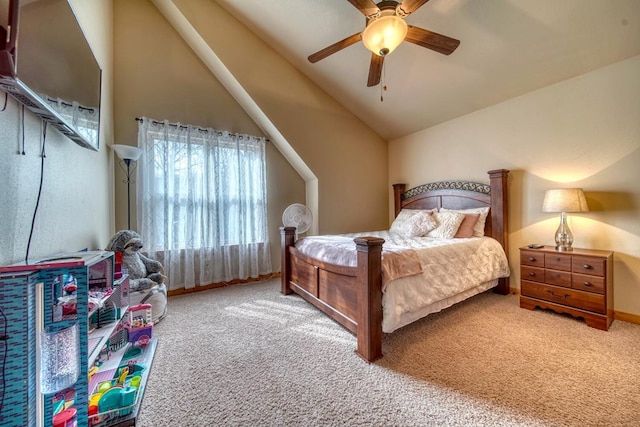 carpeted bedroom featuring ceiling fan and lofted ceiling