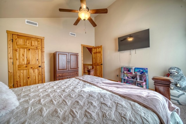 bedroom with ceiling fan and lofted ceiling