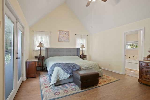 bedroom with light hardwood / wood-style flooring, multiple windows, and ceiling fan