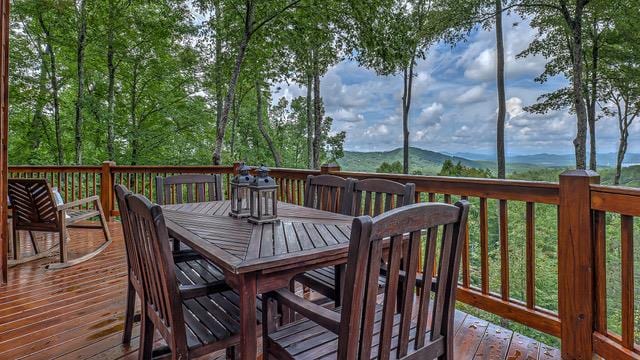 wooden terrace featuring a mountain view