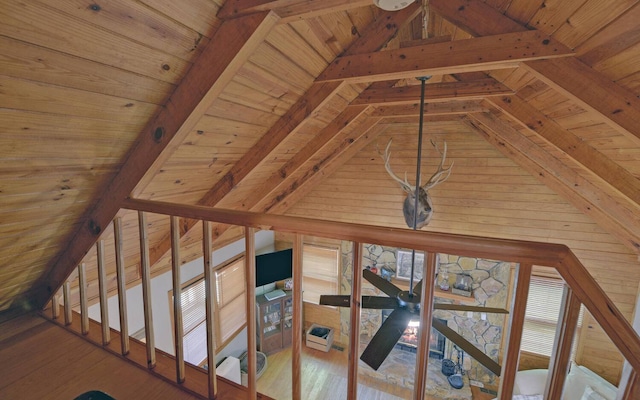 interior details with beamed ceiling, wooden ceiling, and hardwood / wood-style flooring