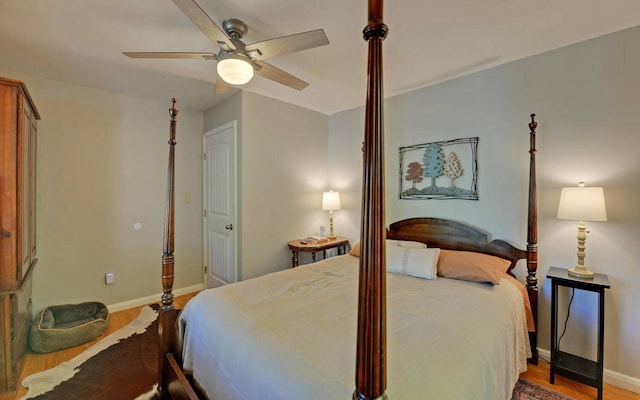 bedroom featuring hardwood / wood-style floors and ceiling fan