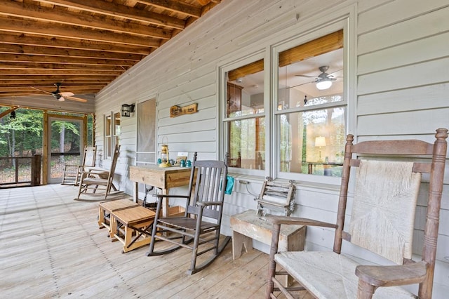 deck featuring ceiling fan and a porch