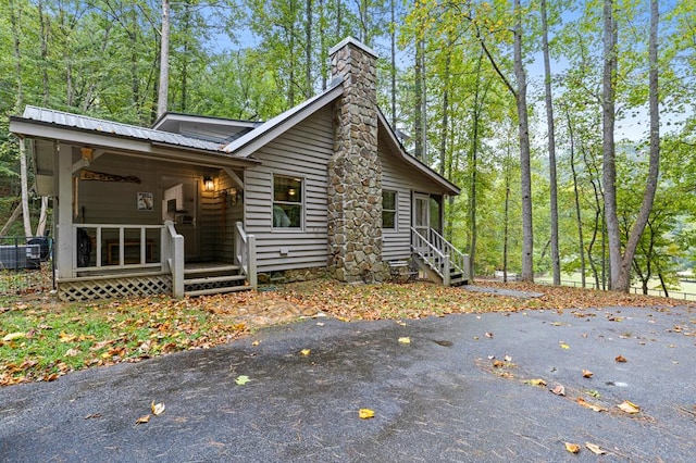 view of home's exterior with covered porch