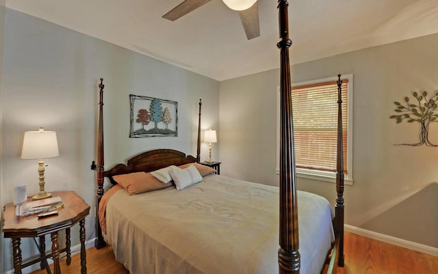 bedroom featuring ceiling fan and light hardwood / wood-style floors